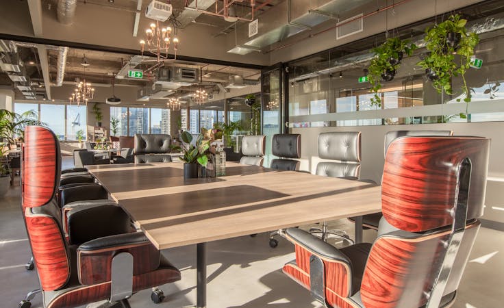 This sleek boardroom comes with flawless CBD views, image 1