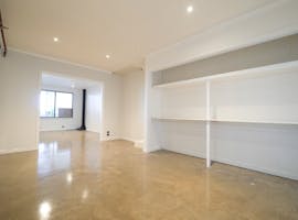 Sleek studio space within converted warehouse, image 1