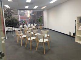 Workplace training, meetings, seminars, presentations, performances, group exercise classes and more, multi-use area at Person Centred Psychology & Allied Health, Group meeting room, image 1