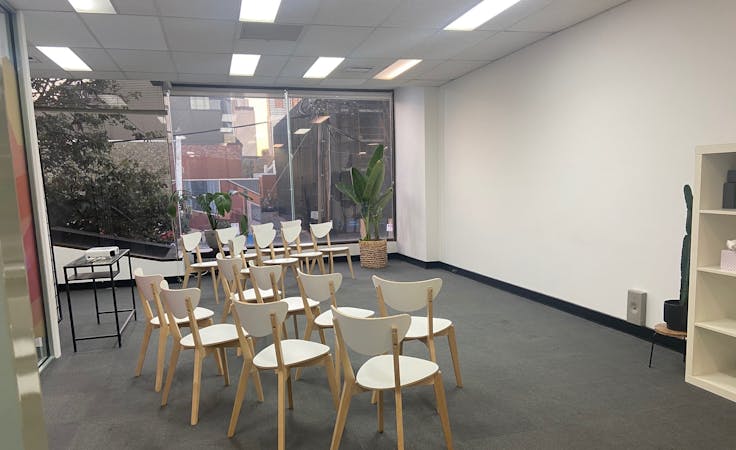 Workplace training, meetings, seminars, presentations, performances, group exercise classes and more, multi-use area at Person Centred Psychology & Allied Health, Group meeting room, image 1